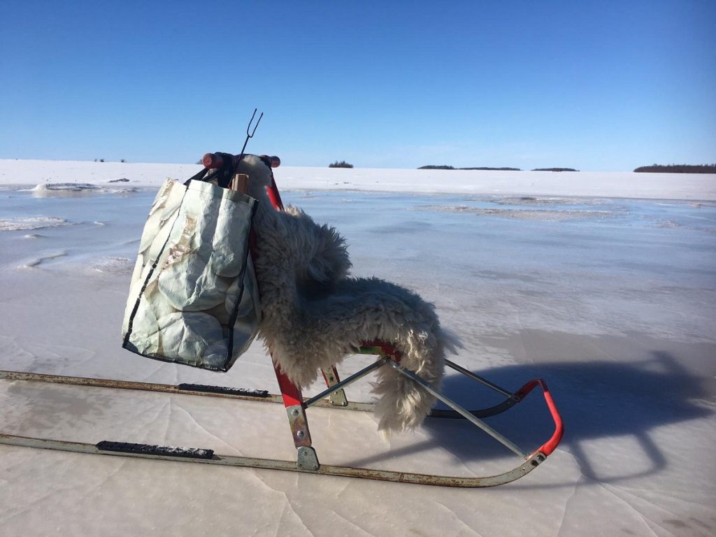 In Finland Juha is on vacation and sledding with his son....